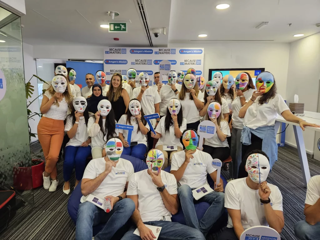 with behind the mask task group of people posing