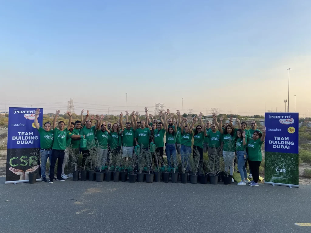 A group of people shows team building activity in uae