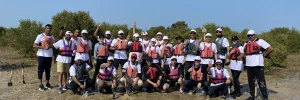 group of individual posing after ready for kayking in dubai