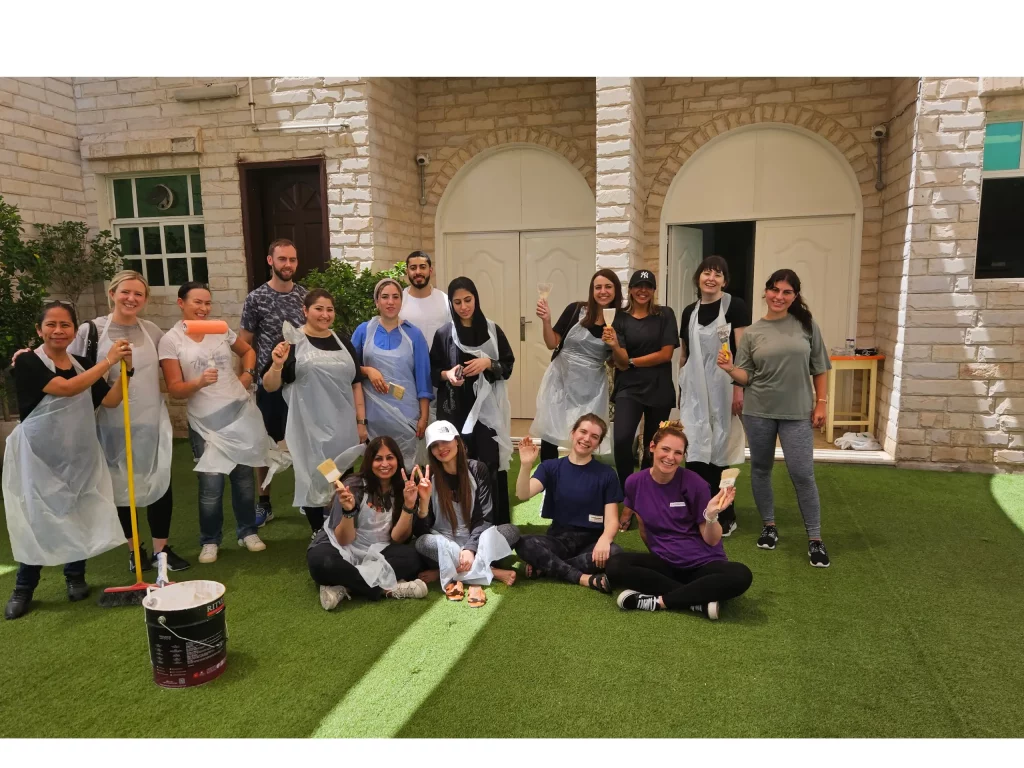 happy poses after wall painting activity for childrens in dubai
