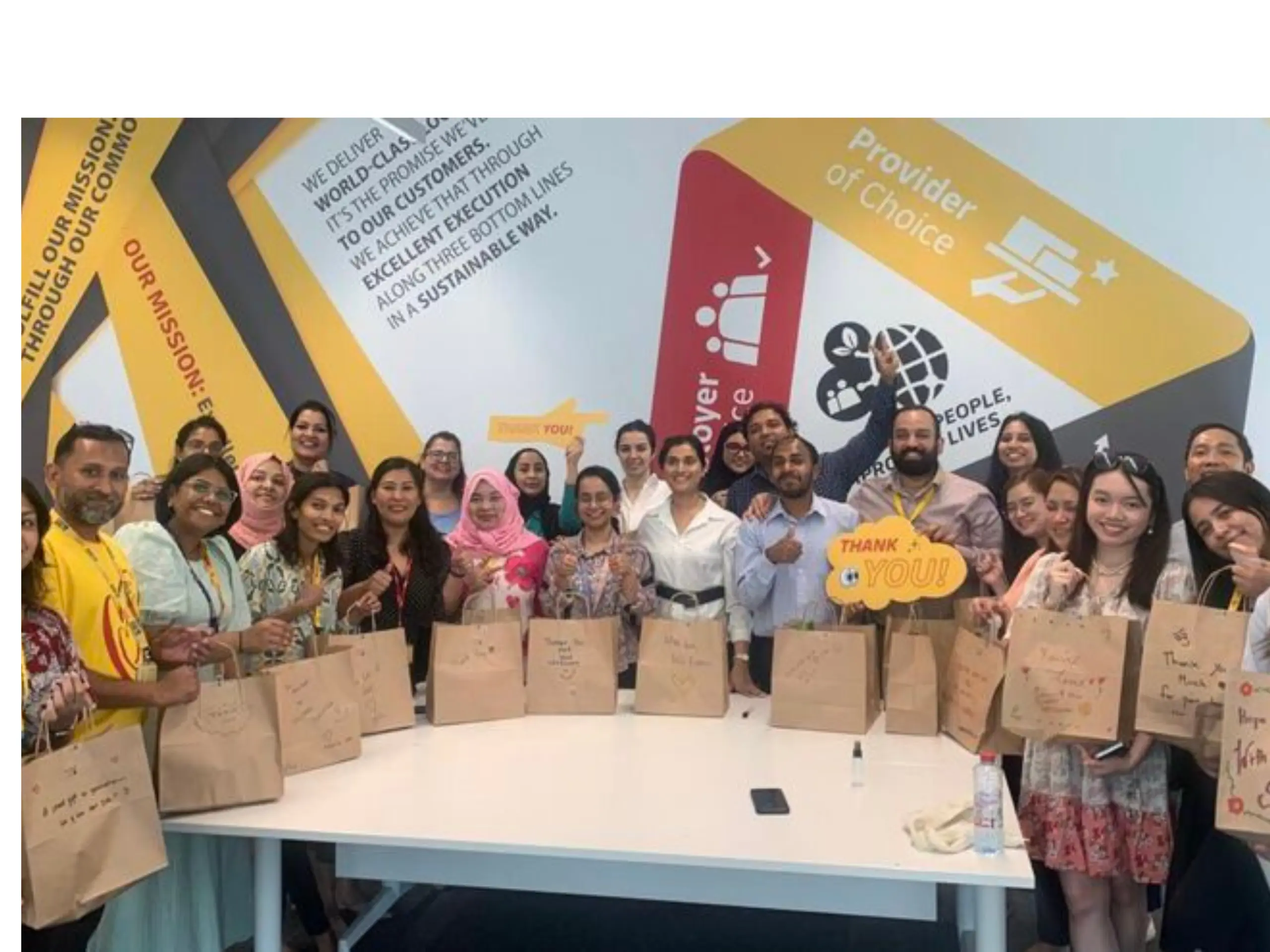 DHL Team Crafting Care Parcels for Dubai Blue-Collar Workers