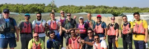 A group of people ready for doing kayaking in uae